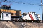 Kennectt Copper electric moves thr RWB Bicentennial caboose into position.